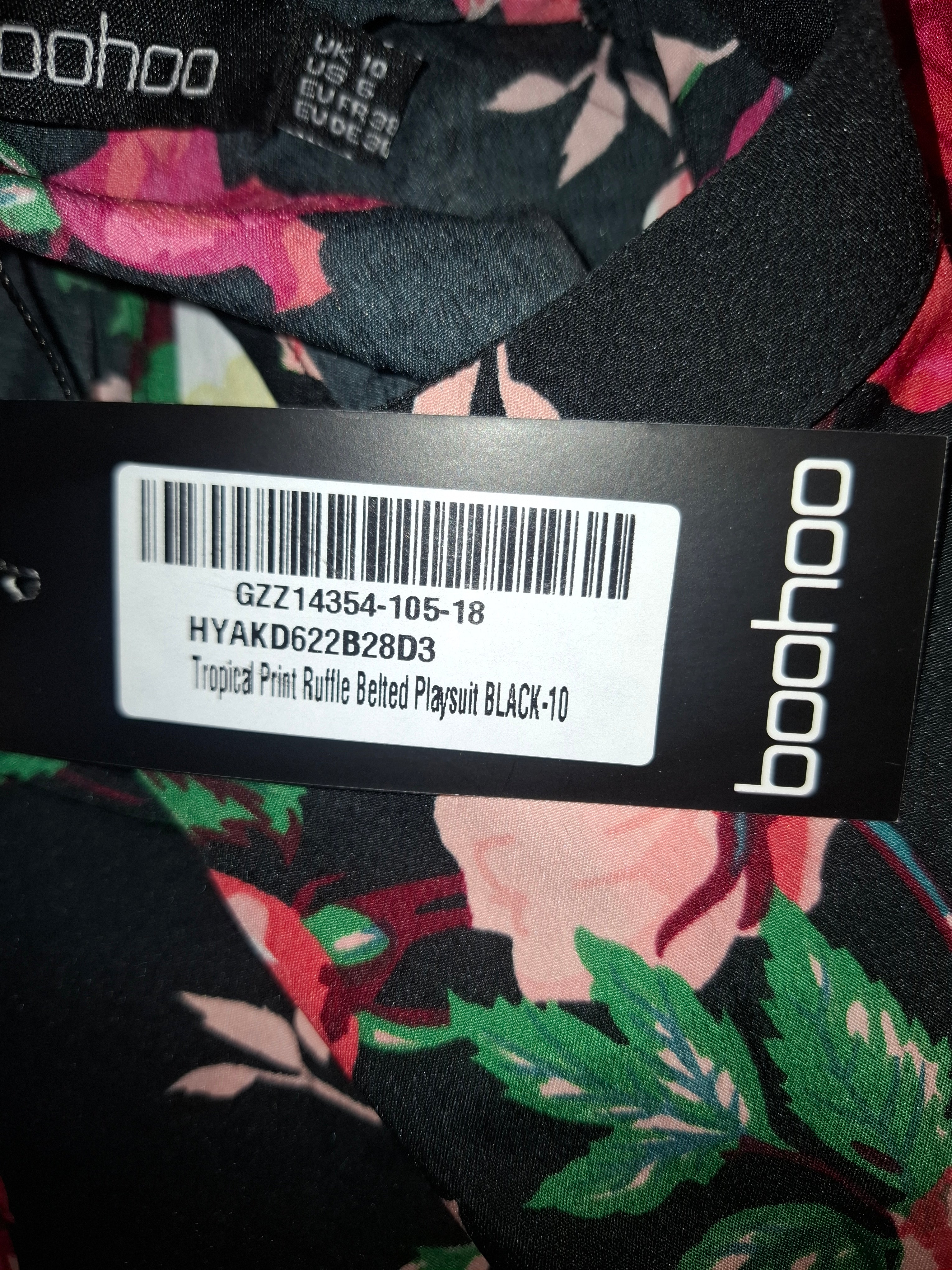 Sort playsuit str 36